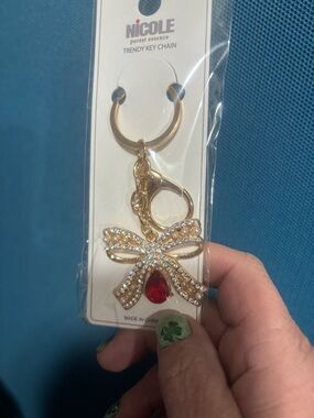 Nicole Gold Bow Keyring with Red Teardrop Gem